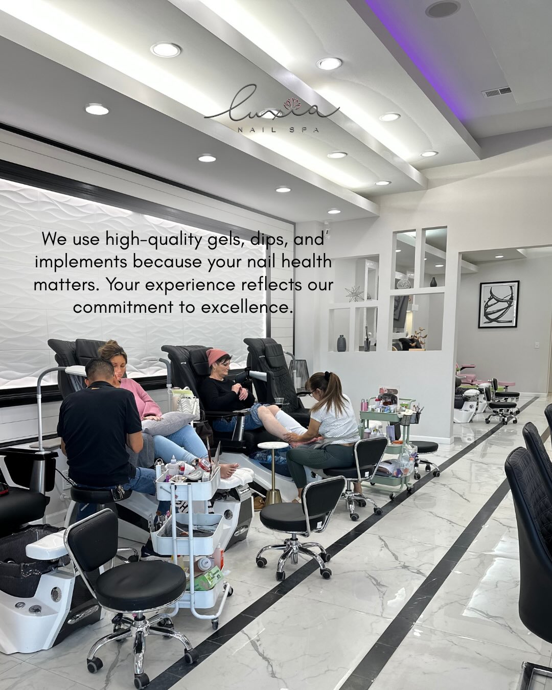 Luxia Nail Spa West Ashley full salon showing pedicure area and marble floors