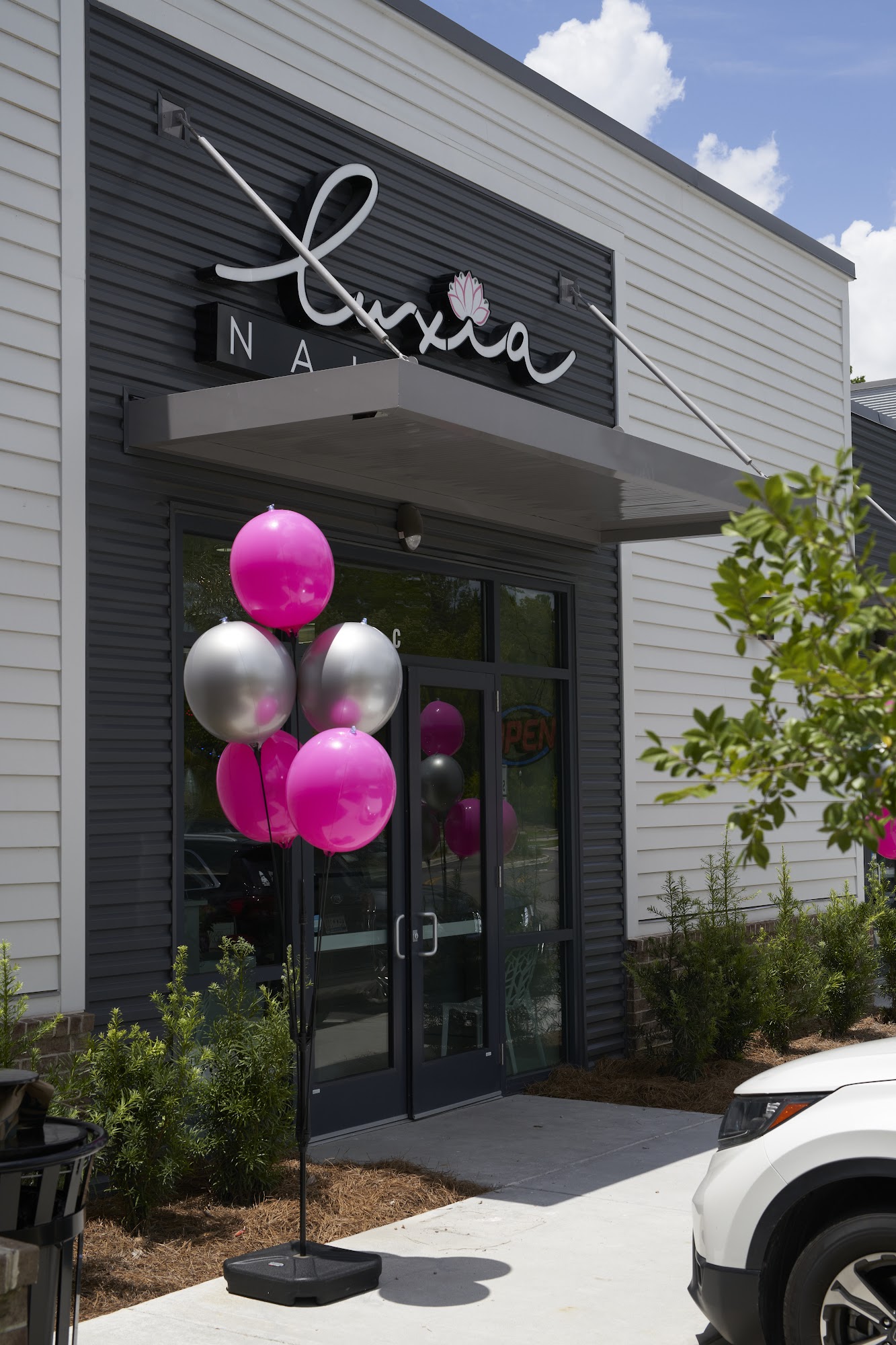 Luxia Nail Spa West Ashley storefront with signature sign